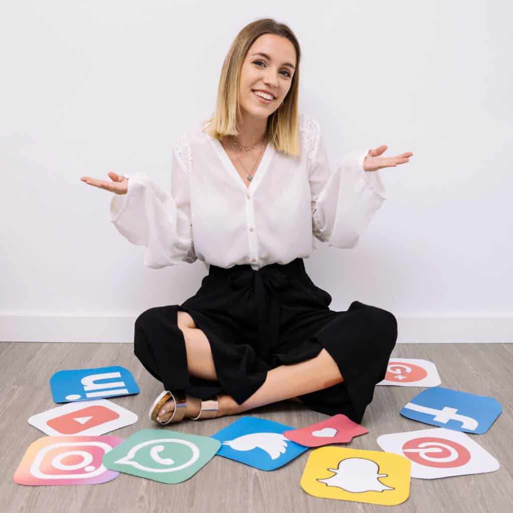 Social Media Platform names on the ground with a woman confused.