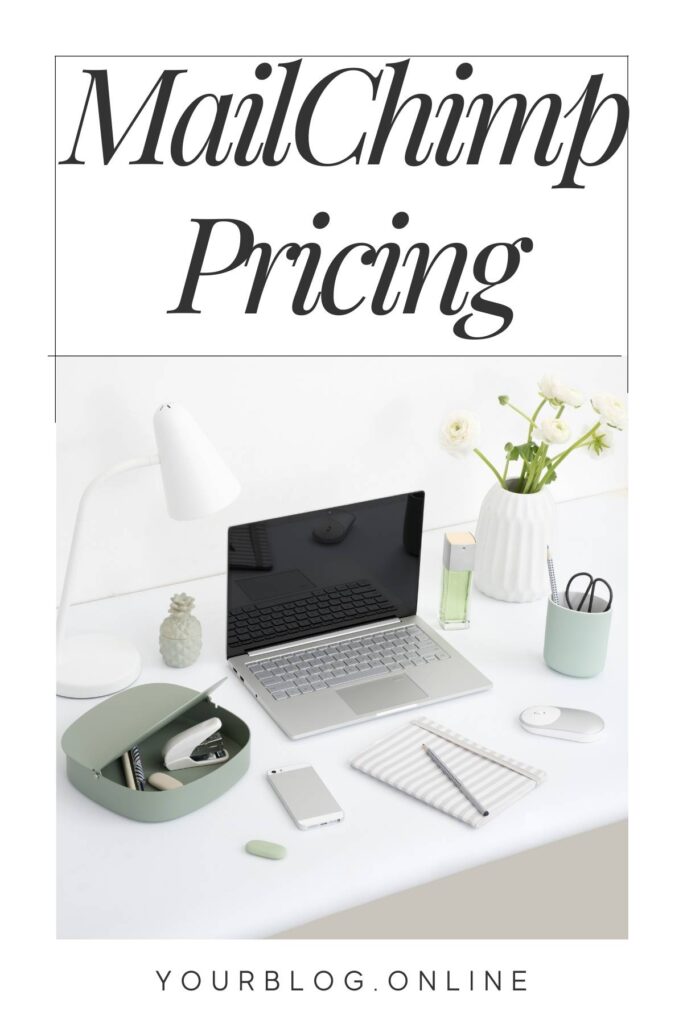Computer on a desk labelled Mailchimp pricing